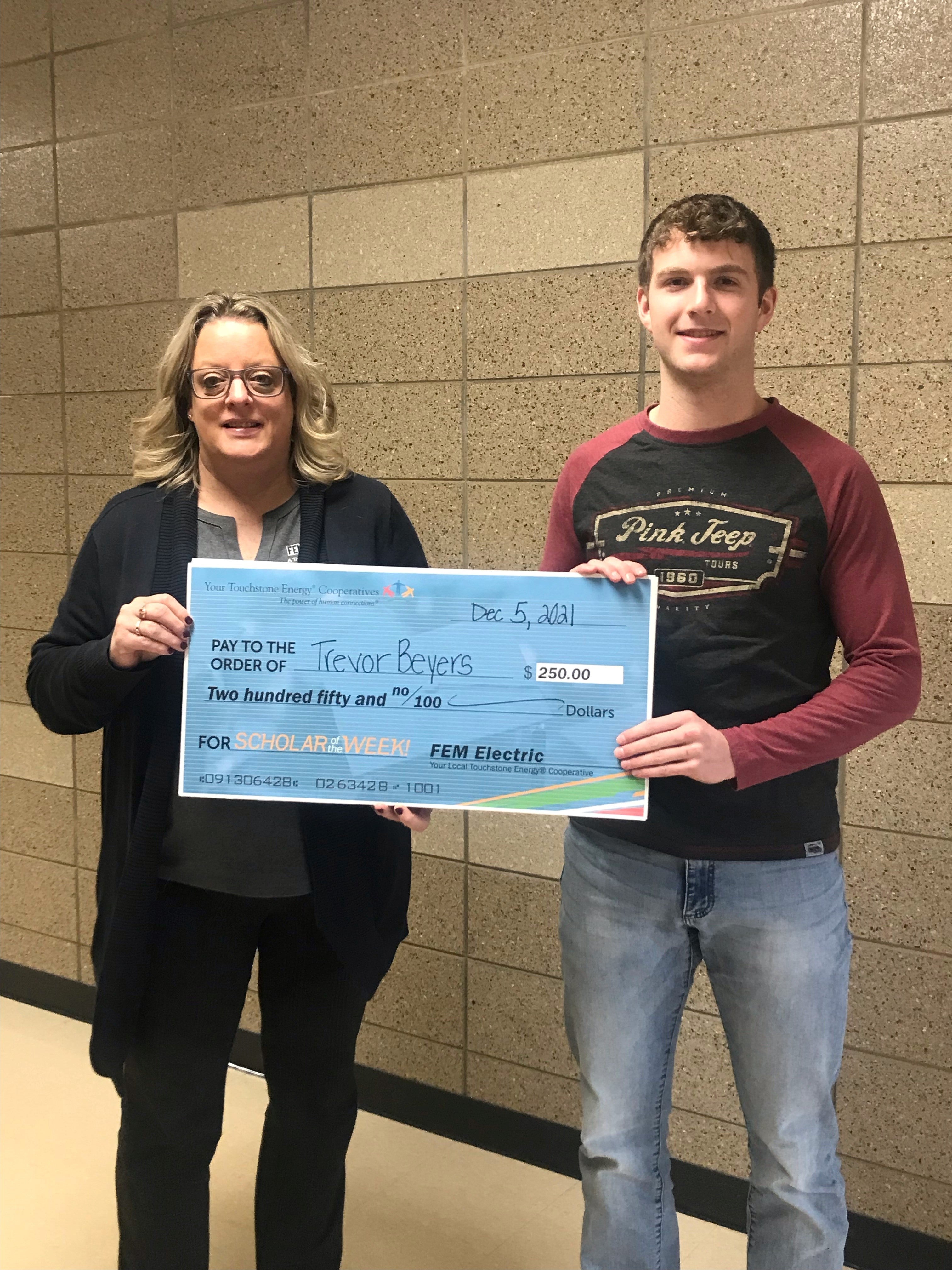 FEM Employee Crystal Thorson with scholarship winner Trevor Beyers